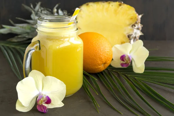 Pineapple juice in a jar with a straw. — Stock Photo, Image