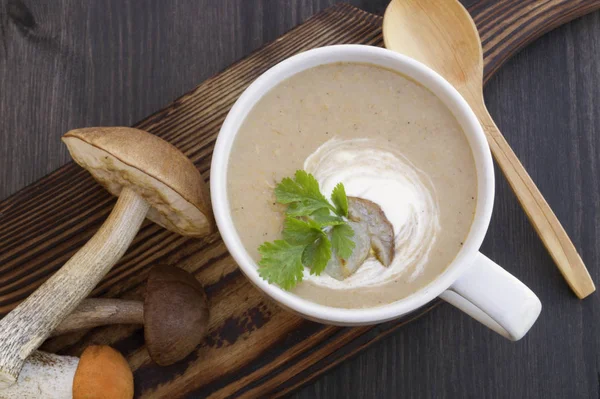 Cream of mushroom soup on a black background. — Stock Photo, Image