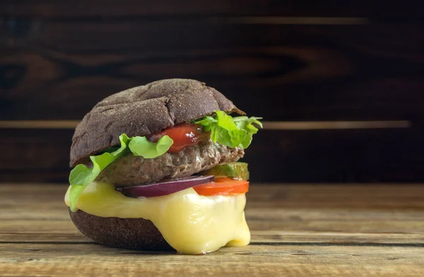 Homemade Burger Rye Bun Wooden Background — Stock Photo, Image