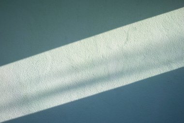 Çimento duvar arka plan doku için güneş ışığı parlar