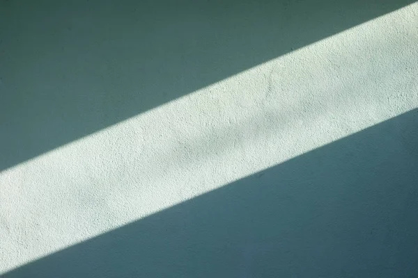 Çimento duvar arka plan doku için güneş ışığı parlar