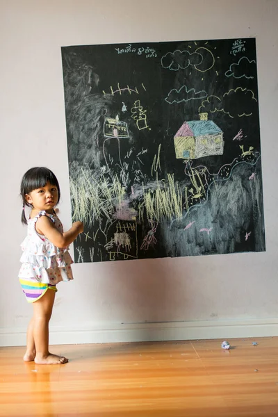 Baby Girl Pupil Draws Chalk Blackboard Stock Picture