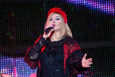 Singer Irina Bilyk during a concer clipart