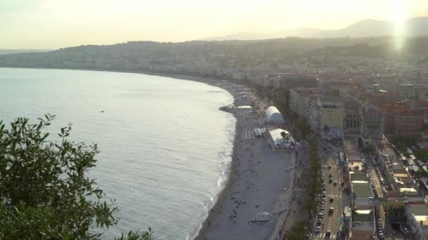 NICE - MAY 06: Tourrists and locals in Nice marina, beach May 06, 2018, France — стоковое видео