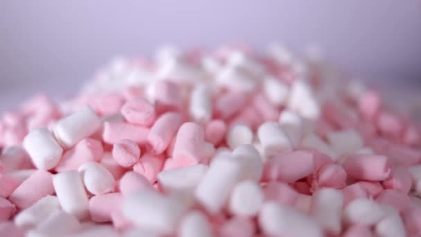 Marshmallow růžový a bílý cukr otáčející se pozadí — Stock video