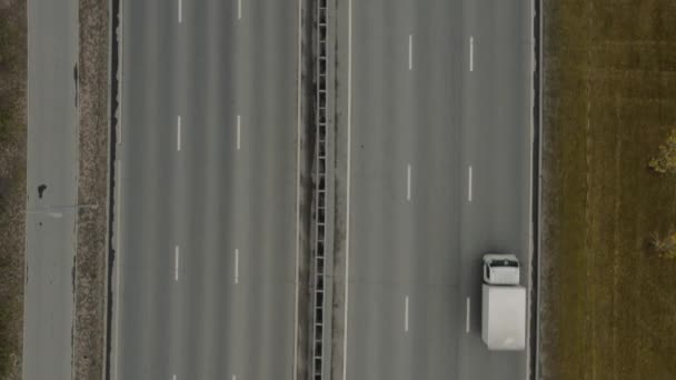 Cars going on six lanes shot from drone. Top view aerial shot — Stock Video