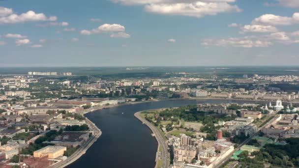 Drone shot of Neva river at Saint Petersburg, under blue cloudy sky — Stok Video