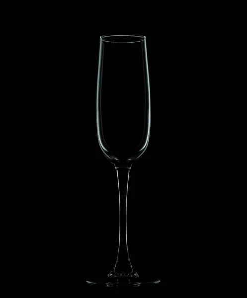 An empty glass on black background (low key)