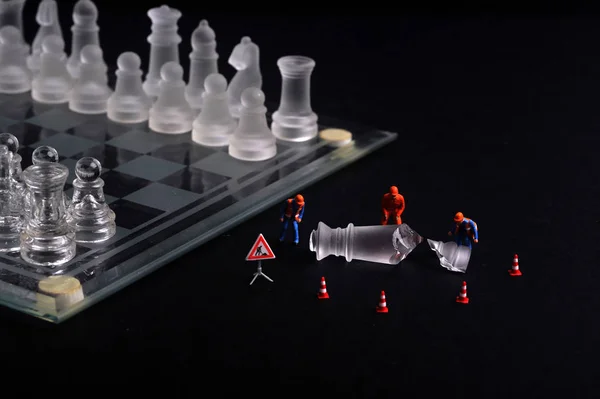 A Man Hand with a Chess Piece in a Board Game. Opening of the Chess Game  with the Move of the White King Pawn E2-e4, Copy Space on Stock Image -  Image