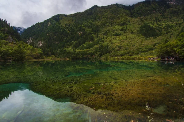 The nature beauty of Jiuzhaigou Valley, China in early morning during autumn.