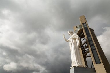 A wide angle view of the impressive El Santisimo Jesus statue near Bucaramanga, Colombia. clipart
