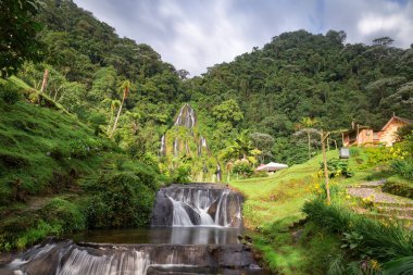 Waterfall near the Santa Rosa Thermal Spa near Santa Rosa de Cabal in Colombia. clipart