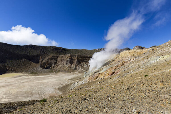 Part of the active crater rim spewing sulphur on Mount Egon on Flores Island, Indonesia. 