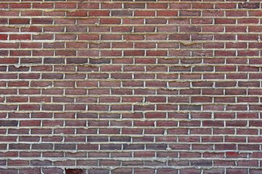 Soyut resim eski kırmızı tuğla doku yıpranmış. 