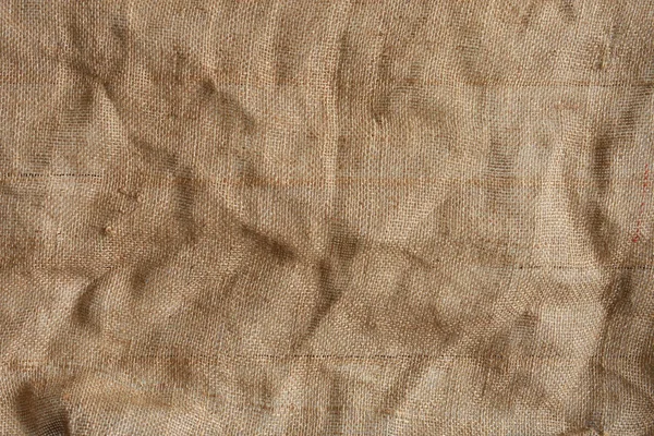 Buruşuk Çuval Bezi Kumaş Dokusunun Soyut Bir Resmi — Stok fotoğraf