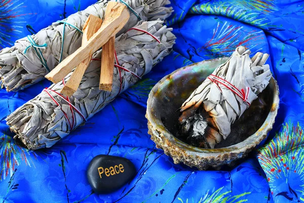 Image White Sage Bundles Abalone Shell Bright Blue Silk Background — Stock Photo, Image