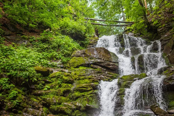 Waterfall in forest. Waterfall Shipot, Transcarpathia, Ukraine