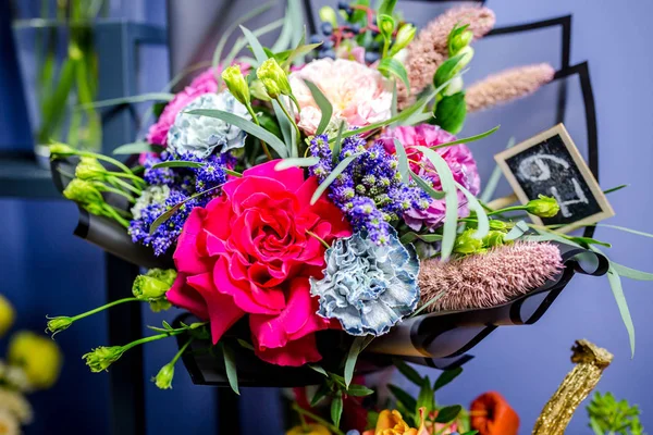 delicious edible bouquet of flowers and food in a flower shop