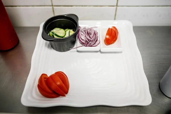 preparation of vegetables for cooking in the restaurant