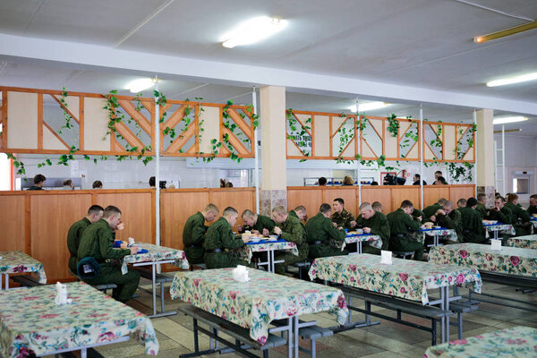 MINSK, BELARUS - 3 MARCH, 2019: soldiers eat in the army canteen
