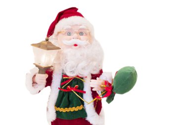 Oyuncak Santa Klaus bir fener ile