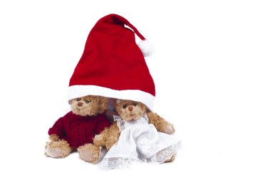 Peluş ayı beyaz arka plan üzerinde izole Santa şapka