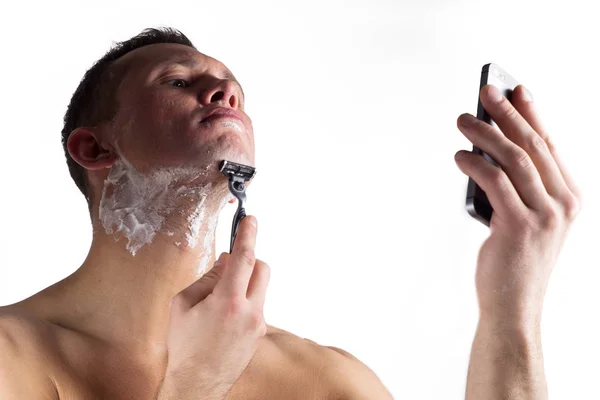 Primo Piano Del Giovane Che Applica Crema Barba — Foto Stock