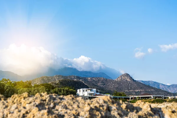 Hotels on the beach in Crete. Mountain in Crete