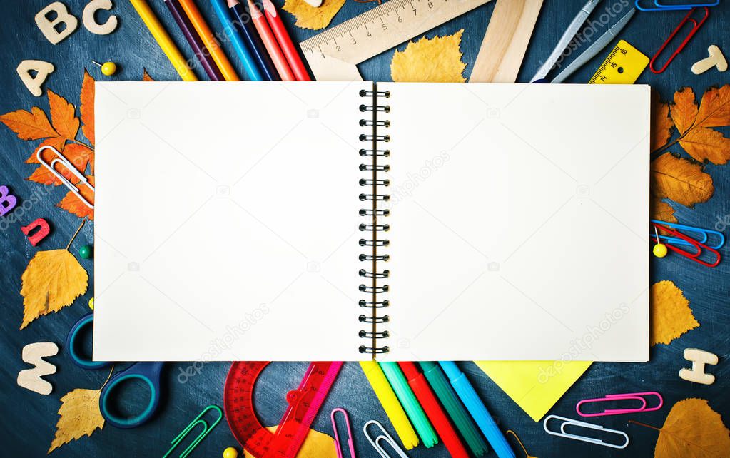 Back to school background with school supplies.View from above.