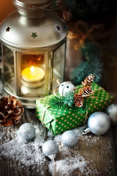 Merry Christmas and happy New year. Christmas gift and Christmas tree on dark wooden background. Selective focus. — Stock Photo, Image