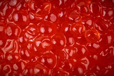 Kırmızı havyar, makro çekim, bir merkezi odaklanmak. Doku. Deniz ürünleri. Sağlıklı beslenme. Diyet. Seçici odak. Yatay