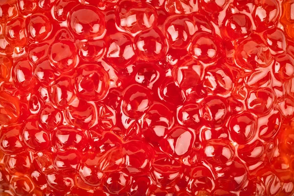 Kırmızı havyar, makro çekim, bir merkezi odaklanmak. Doku. Deniz ürünleri. Sağlıklı beslenme. Diyet. Seçici odak. Yatay