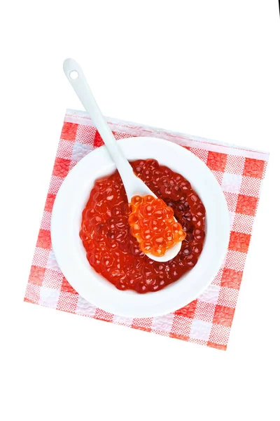 Caviar rojo en un recipiente de vidrio. Objeto aislado sobre fondo blanco. De cerca. . —  Fotos de Stock