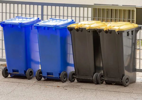 Row of garbage cans for wate separation and recycling