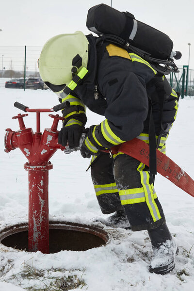 Firefighters extinguish the fire at the enterprise.