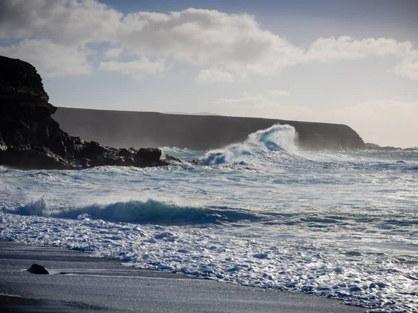 High waves breaking at Playa Negra de Ajuy at Fuerteventura, Spain