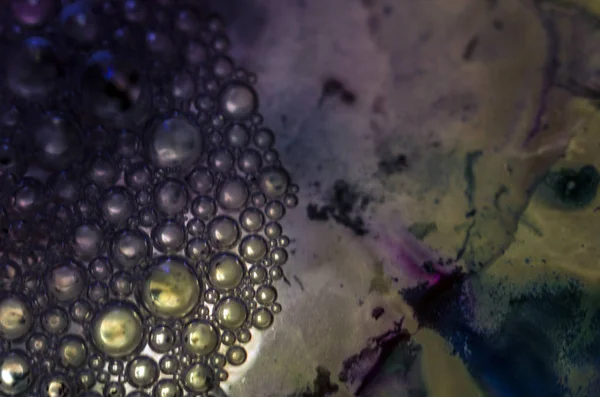 the chemical reaction of the paint with water