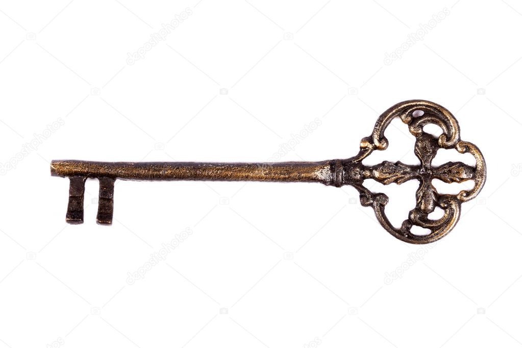 Antique key isolated on white background - photograph