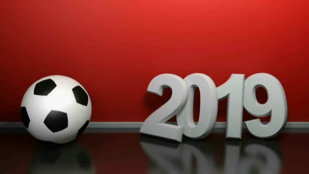 2019 na červené stěně s fotbalovým míčem-3D vykreslování ilustrace — Stock video