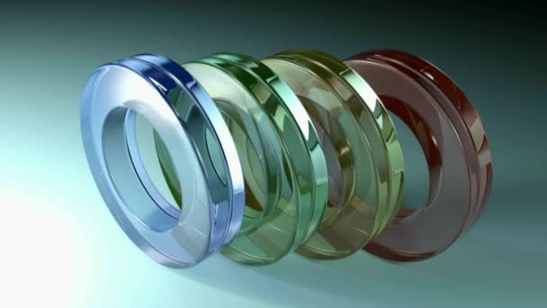 Series Four Transparent Colored Rings Standing Blue Background Lilght Passes — Stock Video