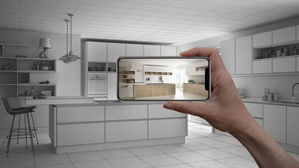 Hand holding smart phone, AR application, simulate furniture and interior design products in real home, architect designer concept, sketch project background, modern kitchen