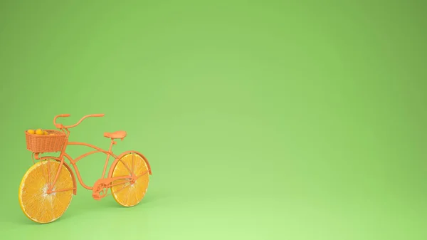 Orange bike with sliced orange wheels, healthy lifestyle concept with green pastel background copy space