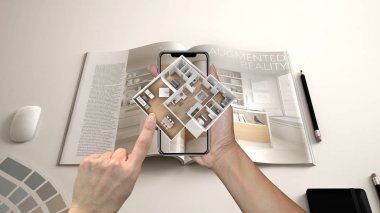 Artırılmış gerçeklik kavramı. 3d açılır etkileşimli ev haritalar hayata benzetimini yapmak için kullanılan Ar uygulaması ile Smartphone tutan el
