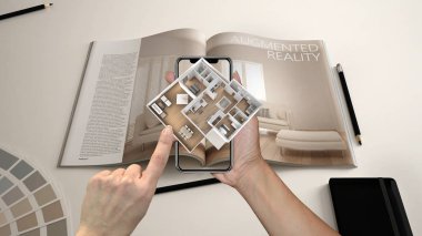 Artırılmış gerçeklik kavramı. 3d açılır etkileşimli ev haritalar hayata benzetimini yapmak için kullanılan Ar uygulaması ile Smartphone tutan el