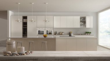 Ahşap antika masa üstü veya mumlar ve çakıl, zen ruh hali ile raf üzerinde bulanık modern beyaz ve ahşap mutfak, en az mimari iç tasarım