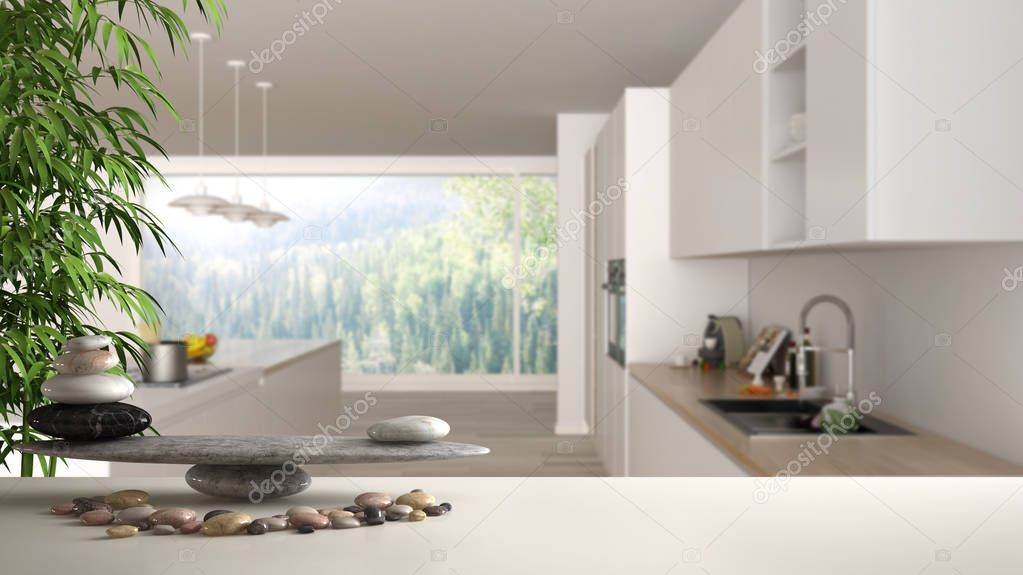 White table shelf with pebble balance and 3d letters making the word feng shui over wooden and white kitchen with island, stools and windows, zen concept interior design