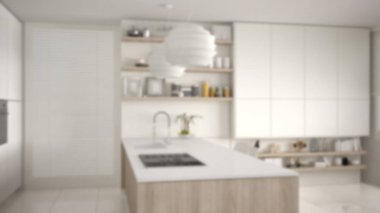 Arka plan iç tasarım, modern mutfak rafları ve dolapları, gaz sobası ve lavabo ile ada bulanıklık. Çağdaş salon, minimalist mimarisi