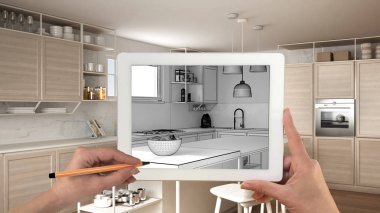 Holding ve tablet gösteren modern beyaz mutfak ahşap detayları Cad çizim el kroki. Gerçek bitmiş iç mimari tasarım sunum arka planda