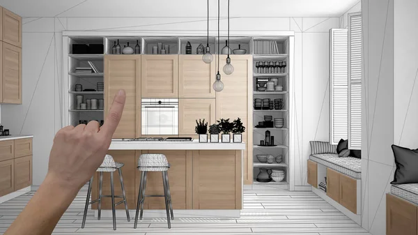 Unfinished project, under construction draft, concept interior design sketch, hand pointing real wooden kitchen with blueprint background, architect and designer idea