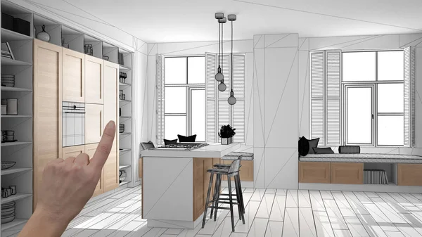 Unfinished project, under construction draft, concept interior design sketch, hand pointing real wooden kitchen with blueprint background, architect and designer idea